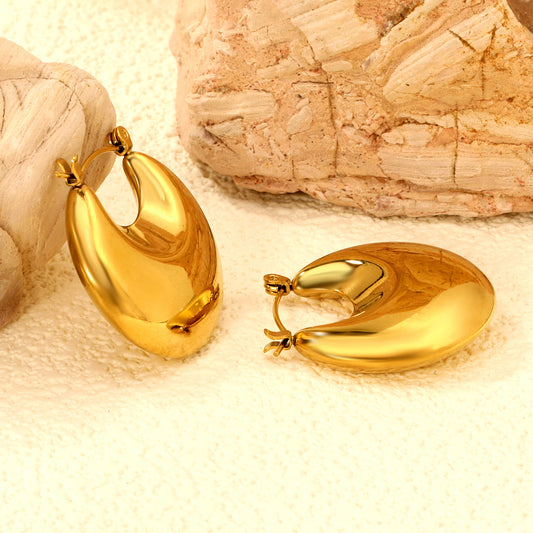 ZANORA  - Hollow Fat Moon Earring