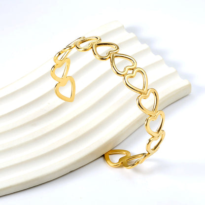 ZANORA  - Multiple Openings In The Shape Of Hollowed-Out Hearts Linked Together Bangle