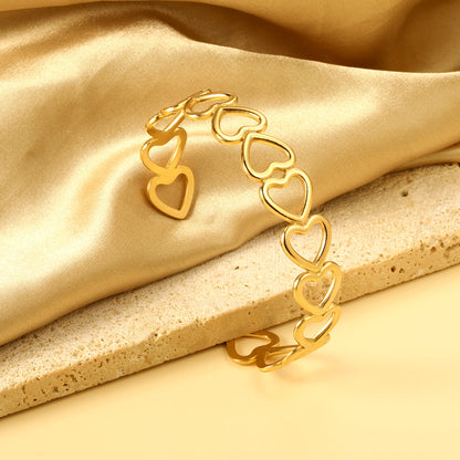 ZANORA  - Multiple Openings In The Shape Of Hollowed-Out Hearts Linked Together Bangle