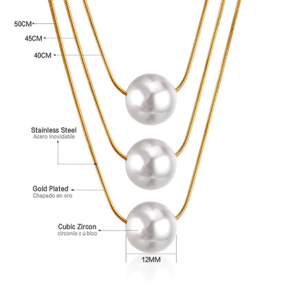 ZANORA  - Triple Layered Pearl Pendant Necklace