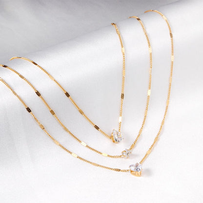 ZANORA  - Triple Layered Heart Shaped Pendant Necklace