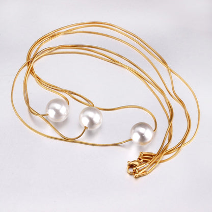 ZANORA  - Triple Layered Pearl Pendant Necklace