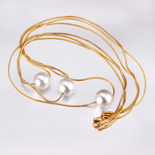 ZANORA  - Triple Layered Pearl Pendant Necklace